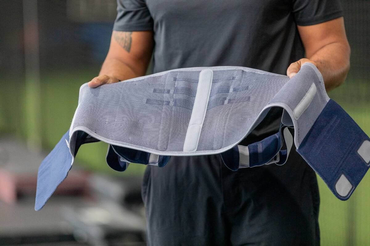 Comment mettre une ceinture lombaire ?